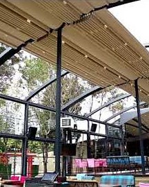 Oval retractable roof pergola for a restaurant, about 20 m long, 6 m high